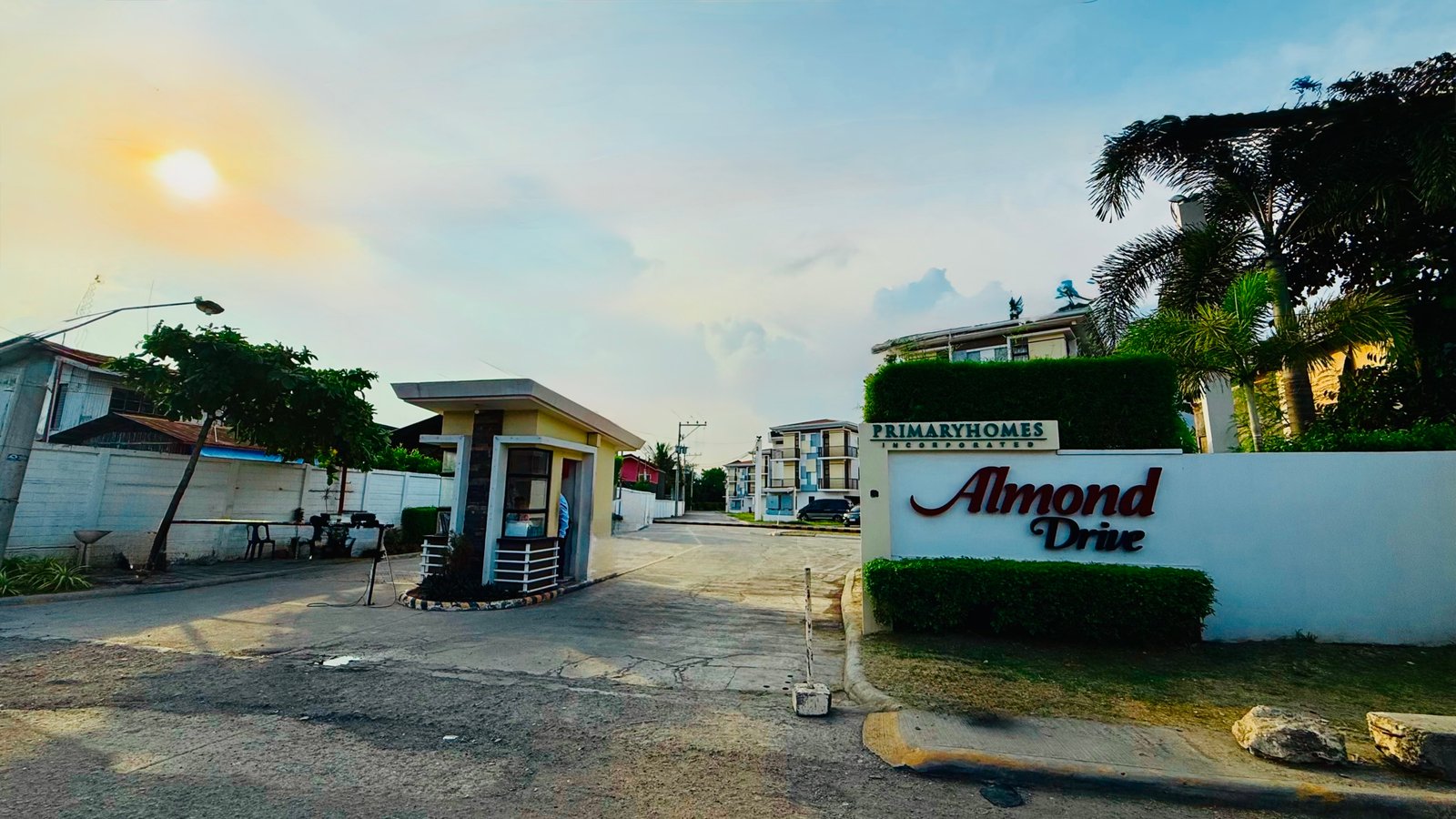 Entrance of Almond Drive Condominium by Primary Homes, which has condo for rent in Tangke Talisay Cebu